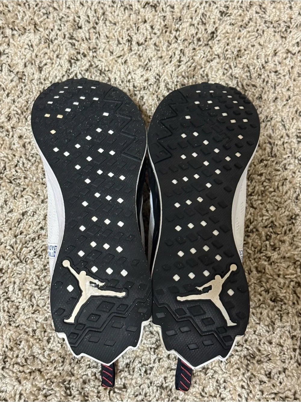 Jordan Men's White Athletic Shoes with Black and Blue Accents